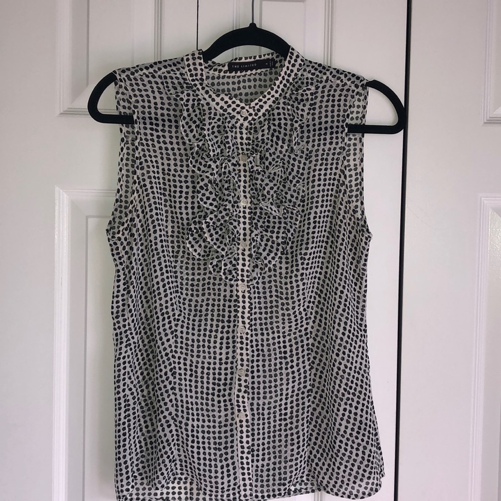 Limited sleeveless polka dot ruffled blouse